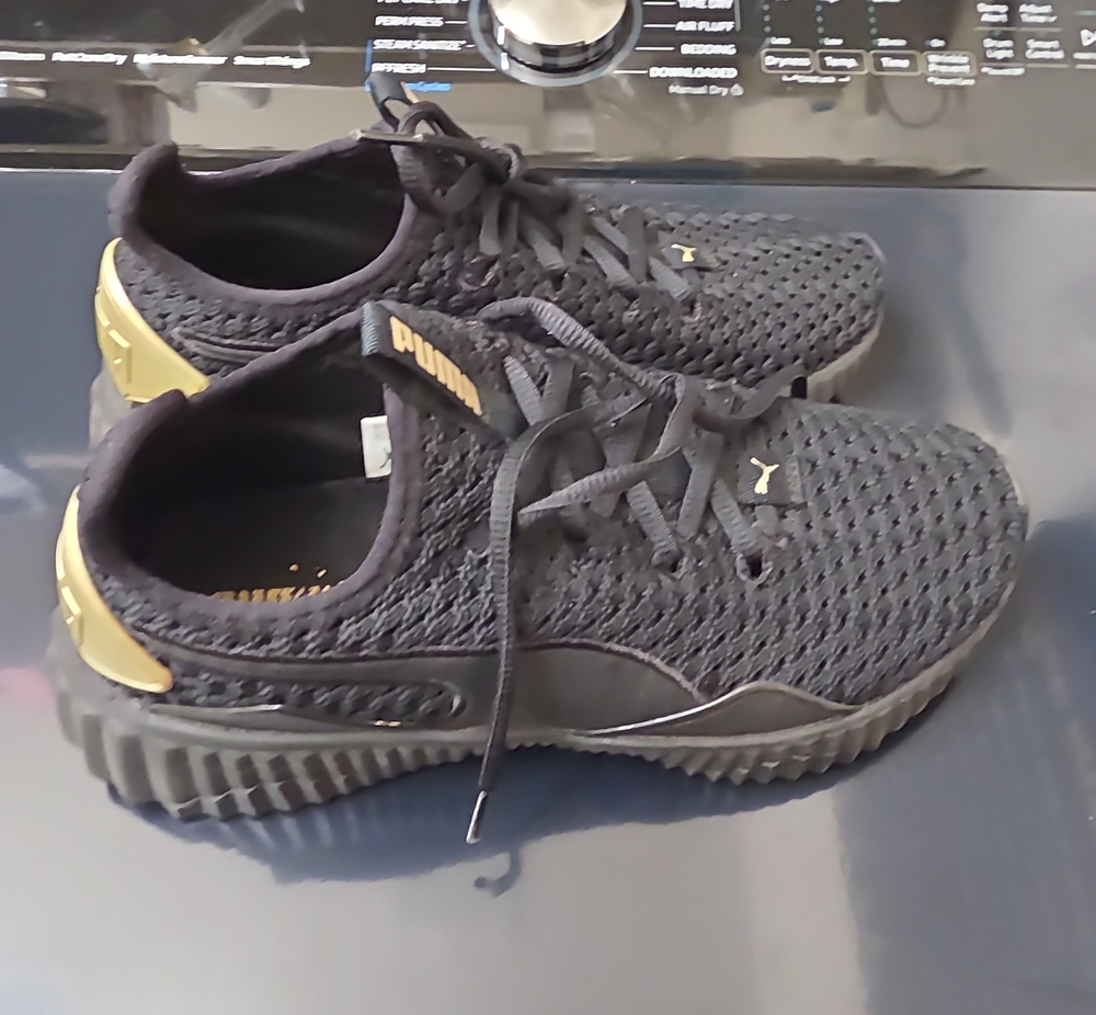 Puma Men's Black Knit Sneakers with Gold Heel Accents